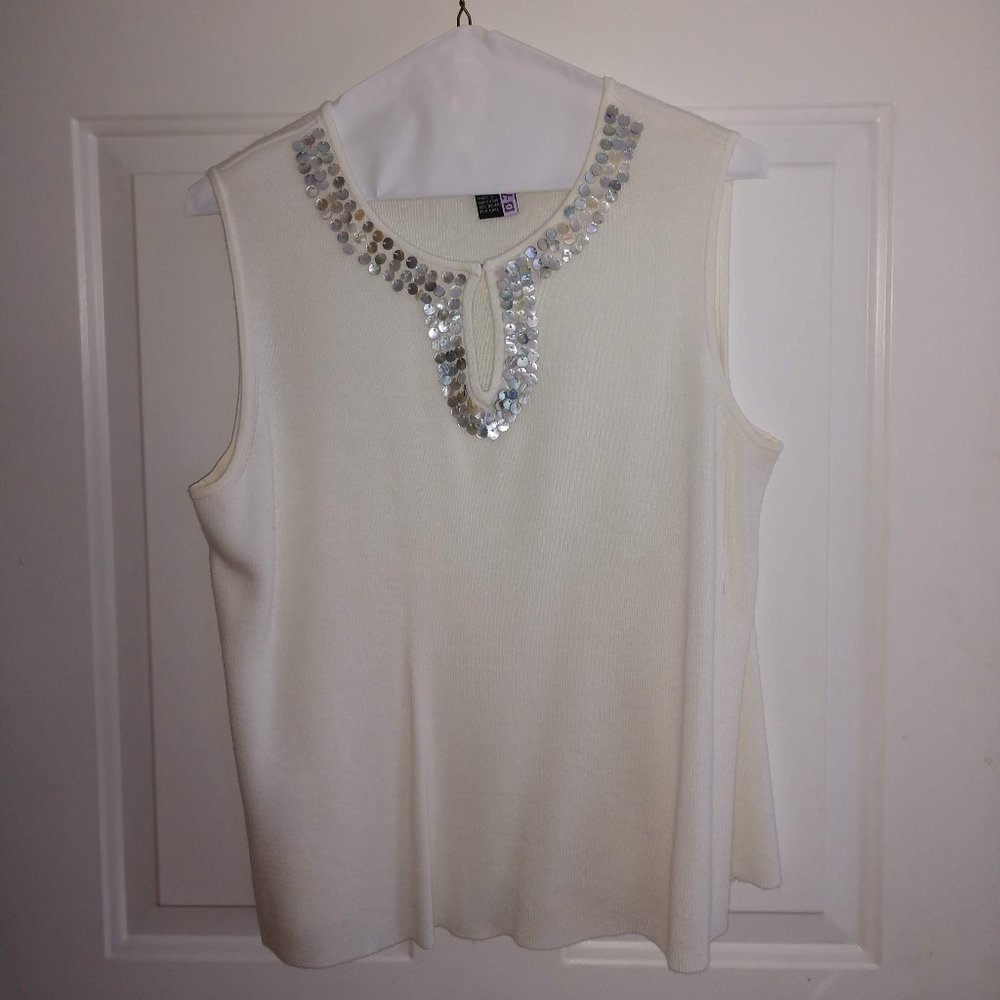Off-white sleeveless sweater with shell sequins